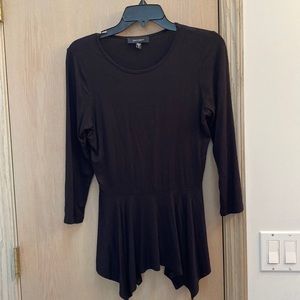 Long-sleeved black top with asymmetrical cut